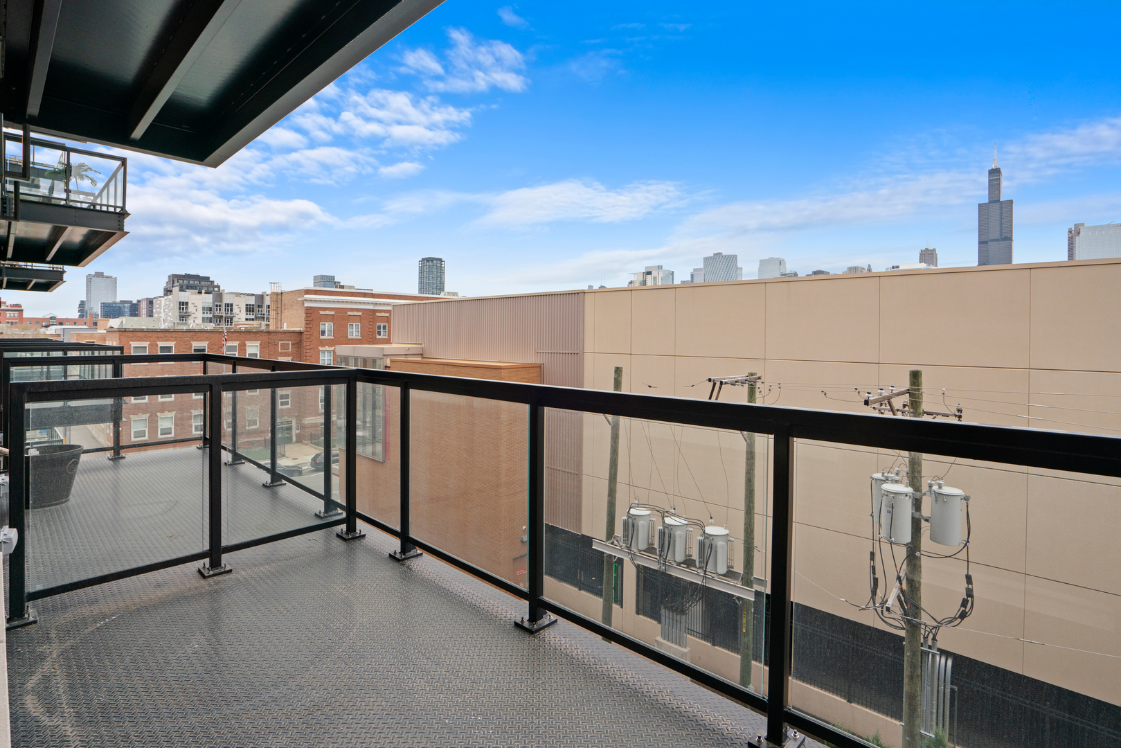 313 South Racine Avenue, Unit 4B Chicago, IL 60607 - Photo 17 of 33 a view of a balcony