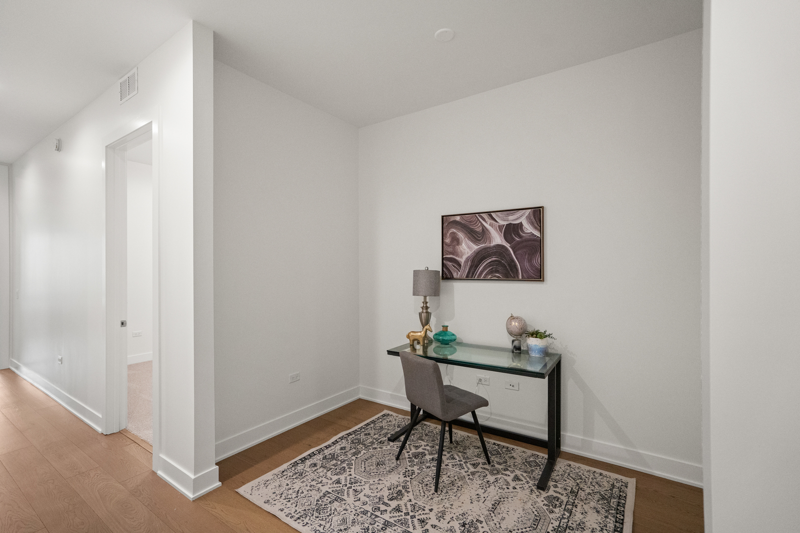 313 South Racine Avenue, Unit 4B Chicago, IL 60607 - Photo 27 of 33 a view of a workspace with furniture