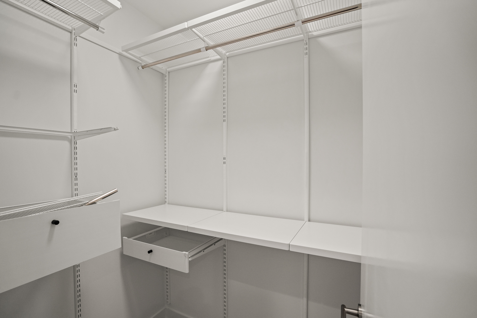 313 South Racine Avenue, Unit 4B Chicago, IL 60607 - Photo 29 of 33 a view of an empty walk in closet