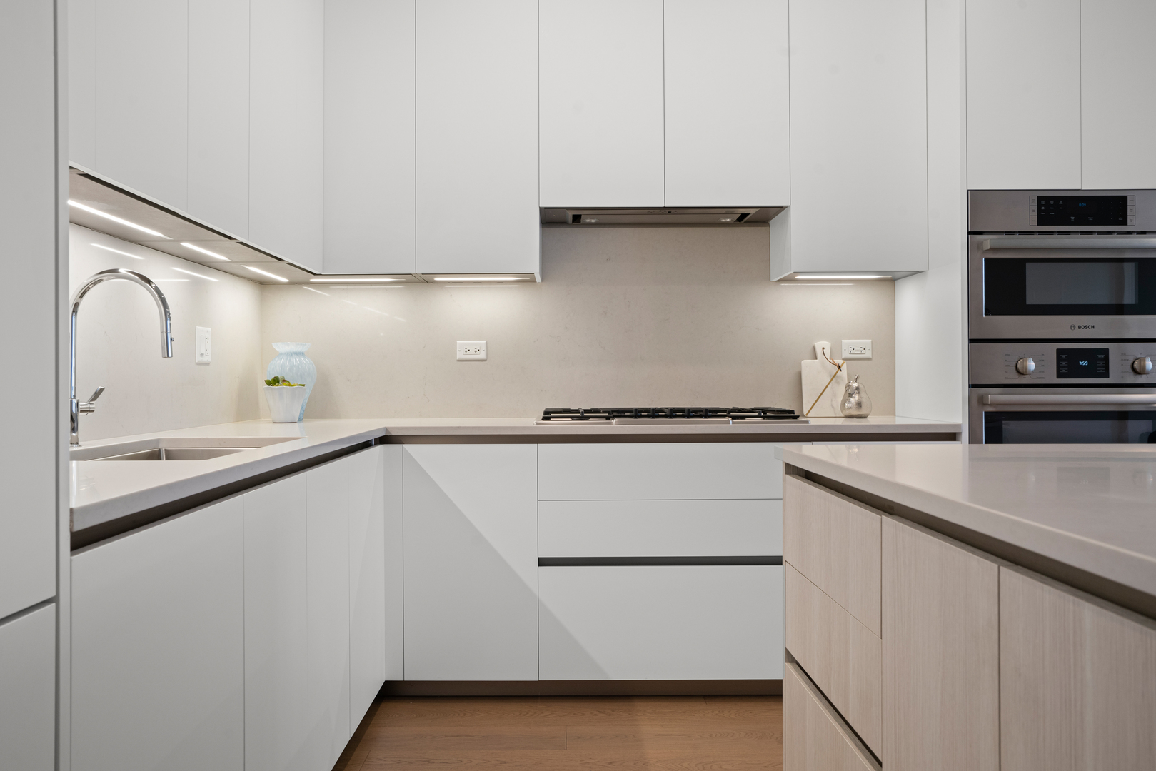 313 South Racine Avenue, Unit 4B Chicago, IL 60607 - Photo 3 of 33 a kitchen with a sink and a refrigerator