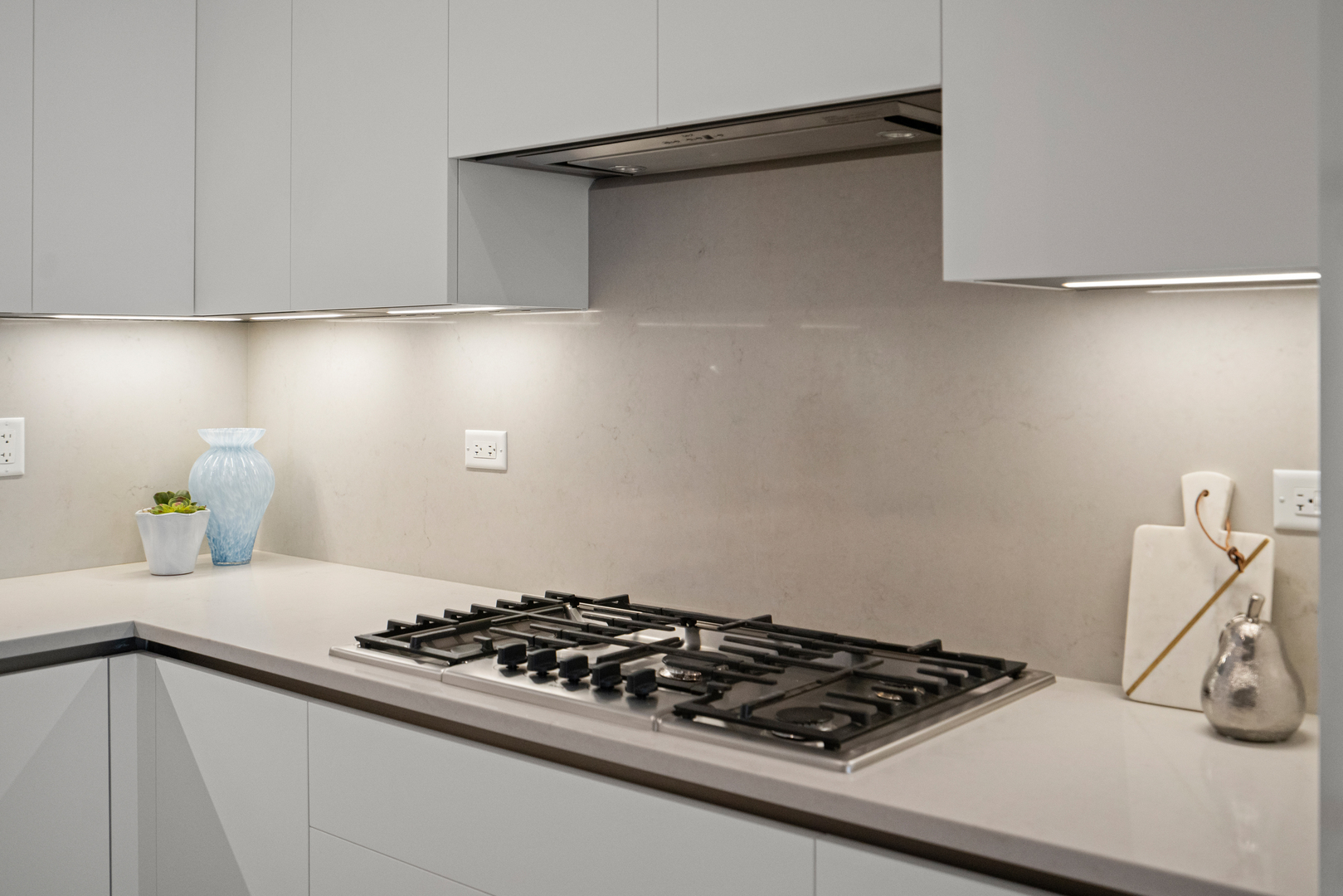 313 South Racine Avenue, Unit 4B Chicago, IL 60607 - Photo 4 of 33 a kitchen with a stove and a sink