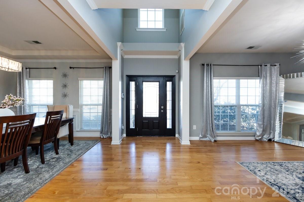 8931 Happiness Road Harrisburg, NC 28075 - Photo 3 of 27 a view of a livingroom with furniture and window