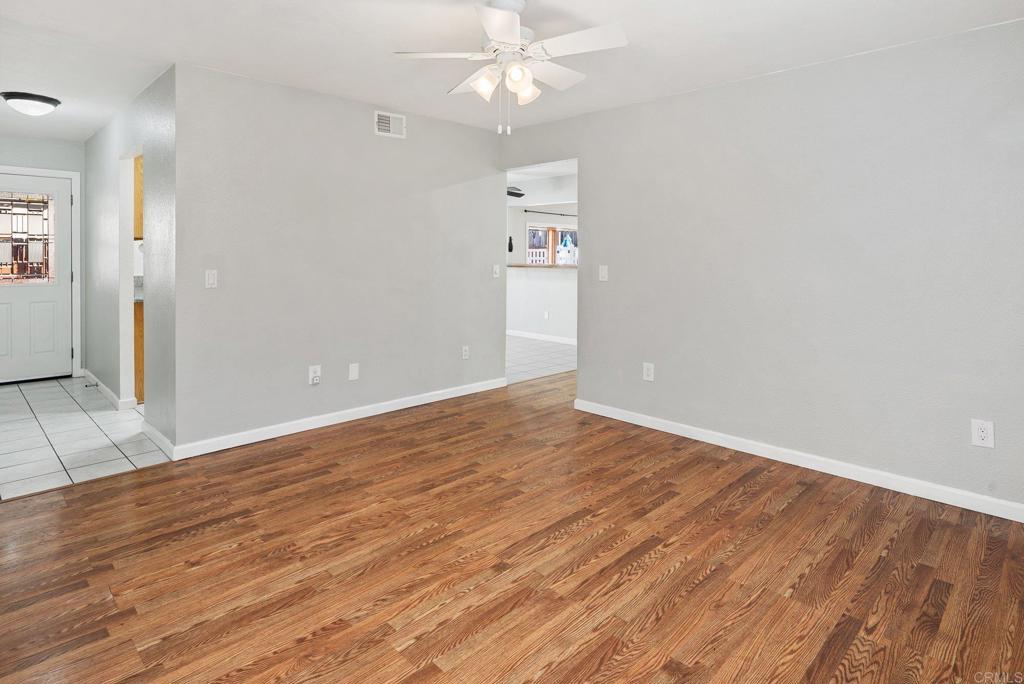 13131 Chrissy Way Lakeside, CA 92040 - Photo 19 of 30 wooden floor in an empty room with a window