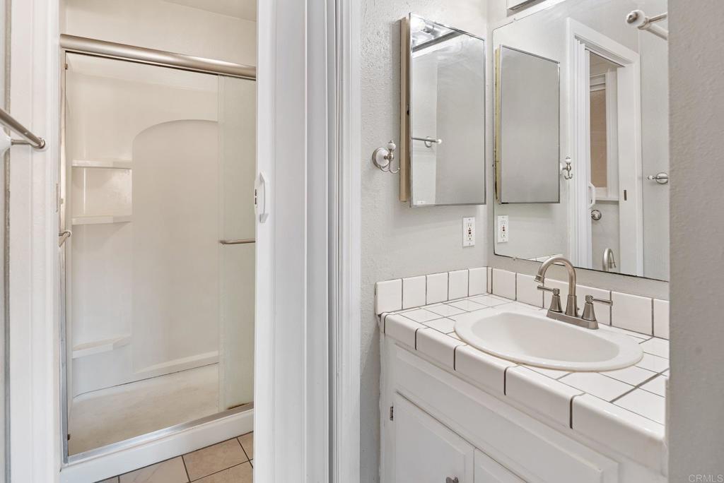 13131 Chrissy Way Lakeside, CA 92040 - Photo 23 of 30 a bathroom with a sink and a mirror