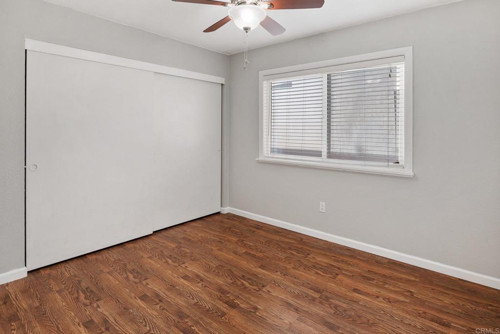 13131 Chrissy Way Lakeside, CA 92040 - Photo 24 of 30 a view of an empty room with wooden floor and a window