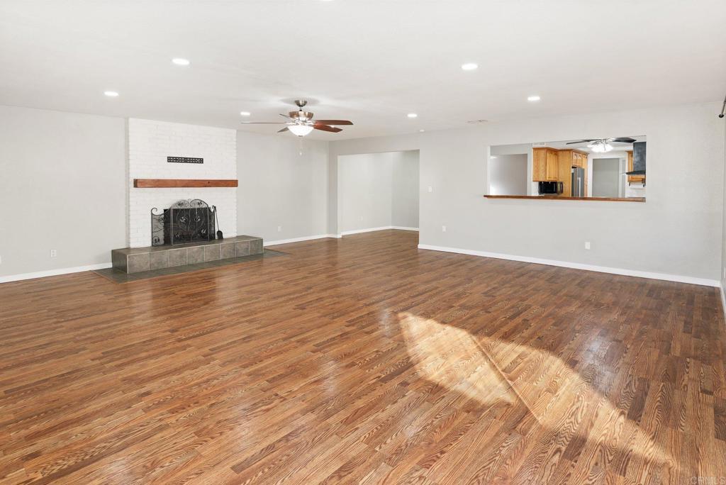 13131 Chrissy Way Lakeside, CA 92040 - Photo 9 of 30 a view of a kitchen with a dishwasher cabinets and wooden floor