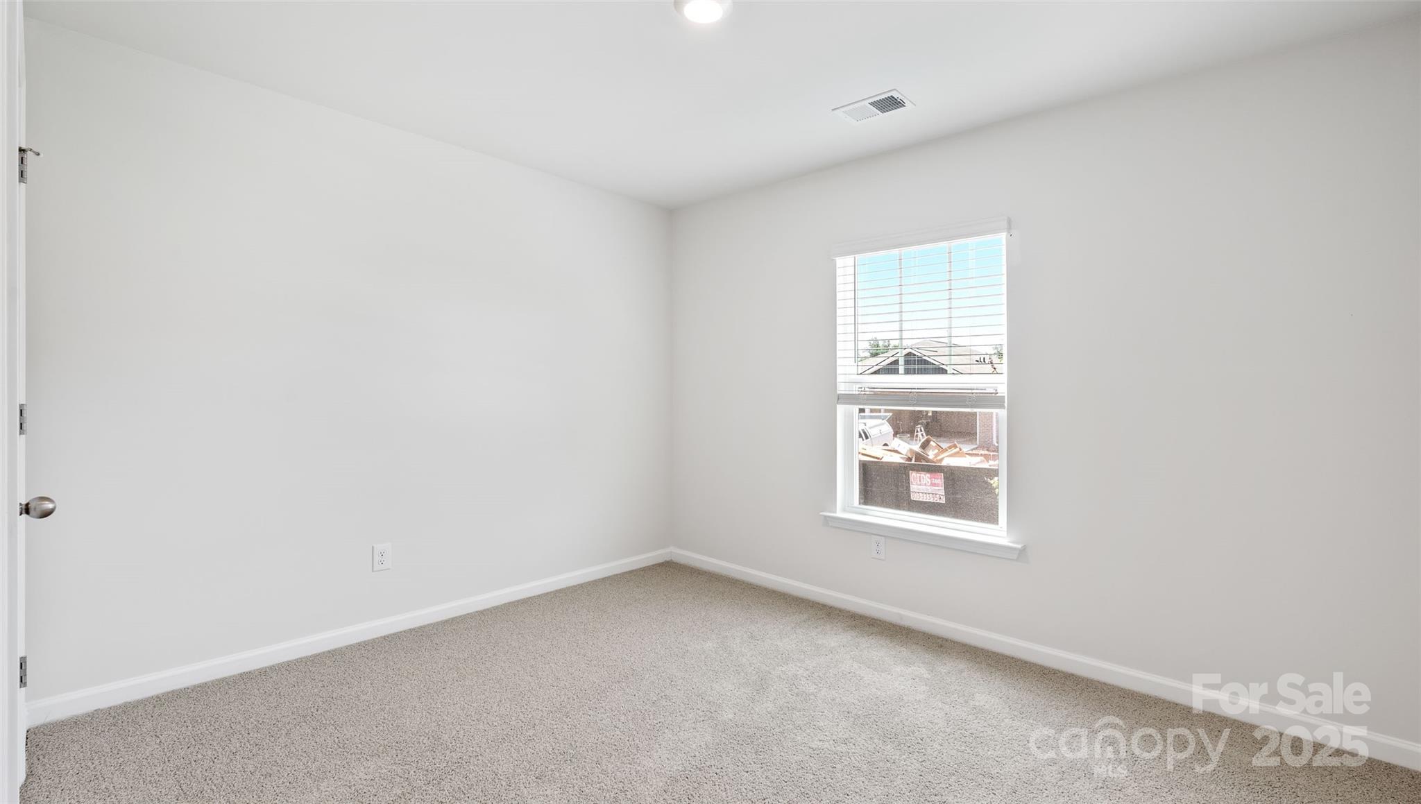 131 Bovine Br Road Fletcher, NC 28732 - Photo 13 of 31 an empty room with a window