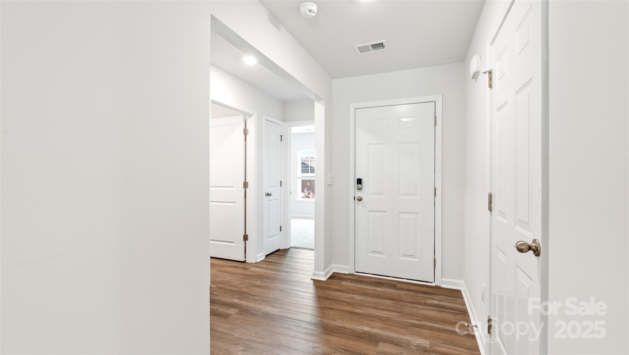 131 Bovine Br Road Fletcher, NC 28732 - Photo 15 of 31 a view of a hallway with wooden floor