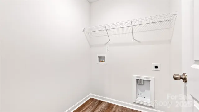 a view of a room with rack on the wall