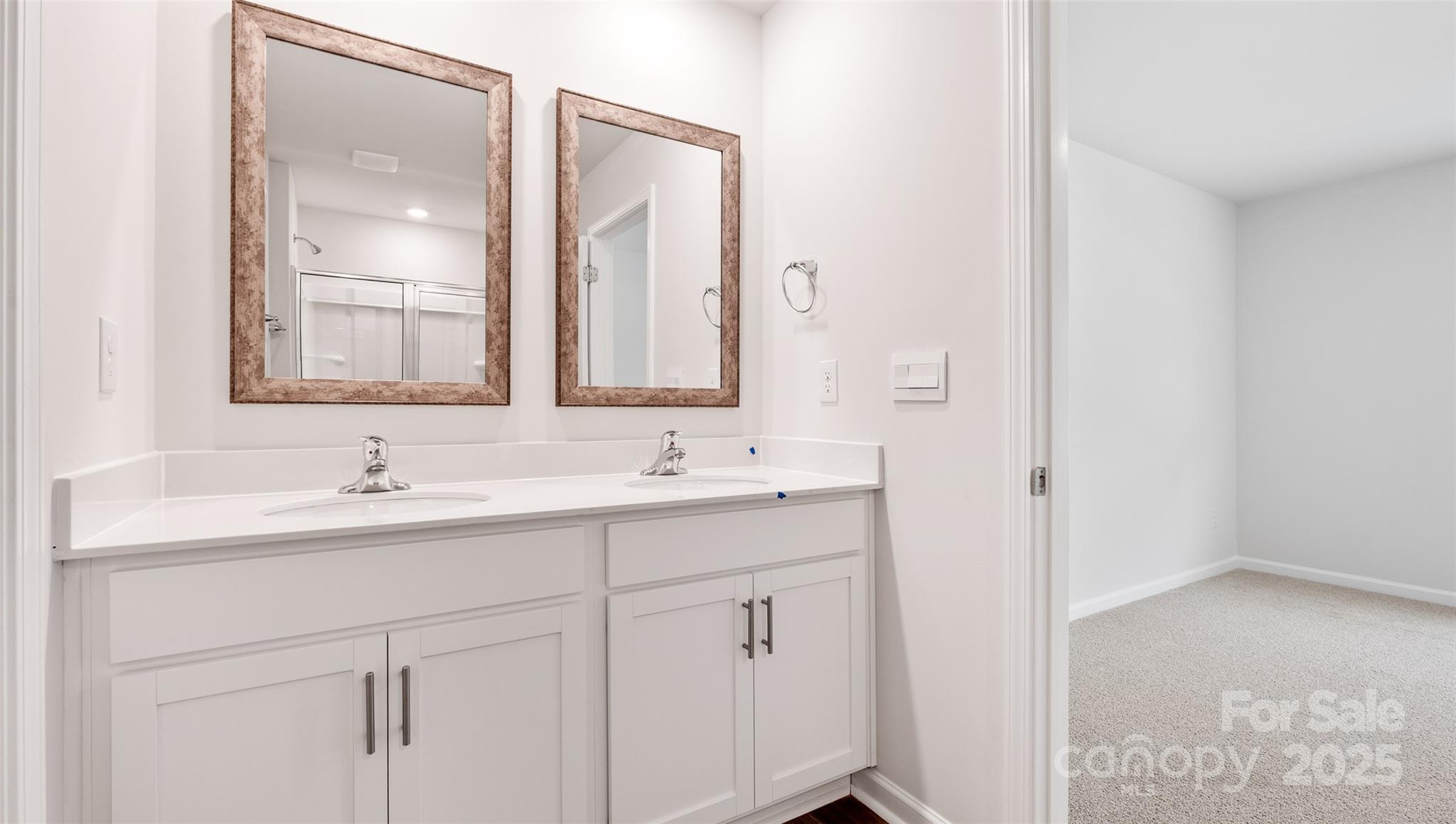 131 Bovine Br Road Fletcher, NC 28732 - Photo 19 of 31 a bathroom with a sink and a mirror