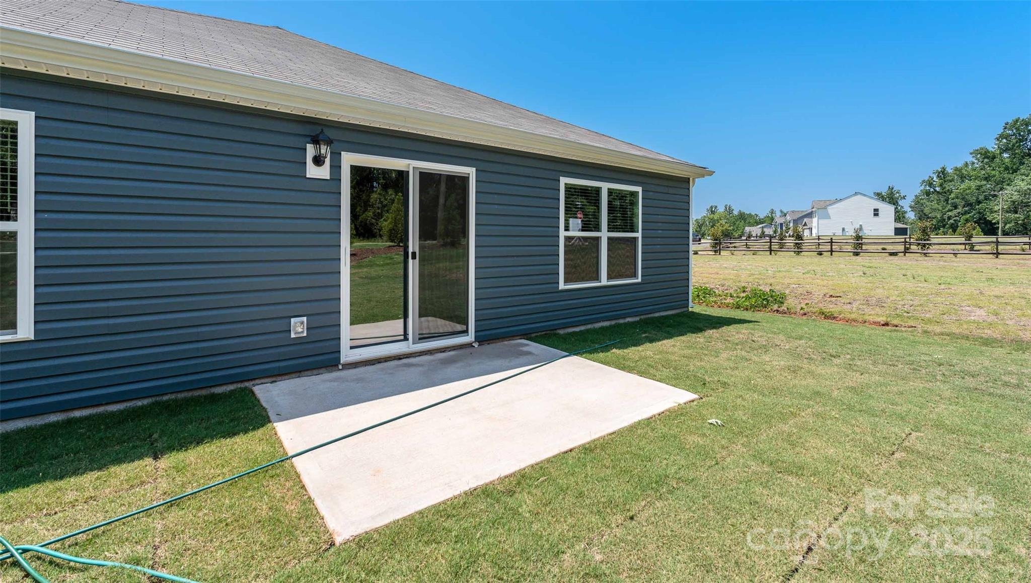 131 Bovine Br Road Fletcher, NC 28732 - Photo 24 of 31 a front view of a house with garden