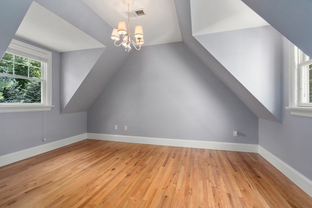 96 Crescent Street, Unit 96 Newton, MA 02466 - Photo 21 of 36 wooden floor in an empty room with a window
