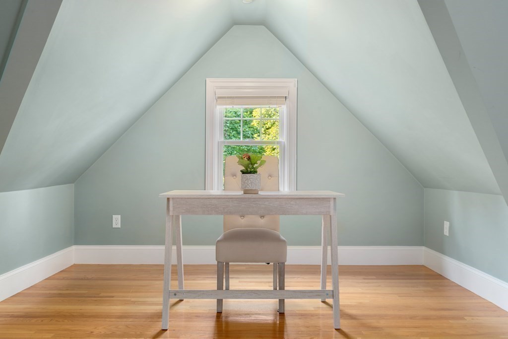 96 Crescent Street, Unit 96 Newton, MA 02466 - Photo 24 of 36 a view of an entryway with wooden floor