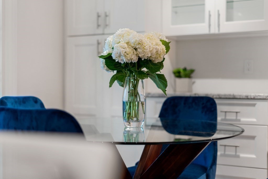 96 Crescent Street, Unit 96 Newton, MA 02466 - Photo 9 of 36 a vase of flowers sitting on a table