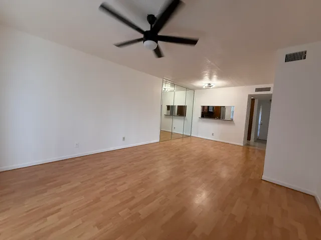 a view of an empty room and window