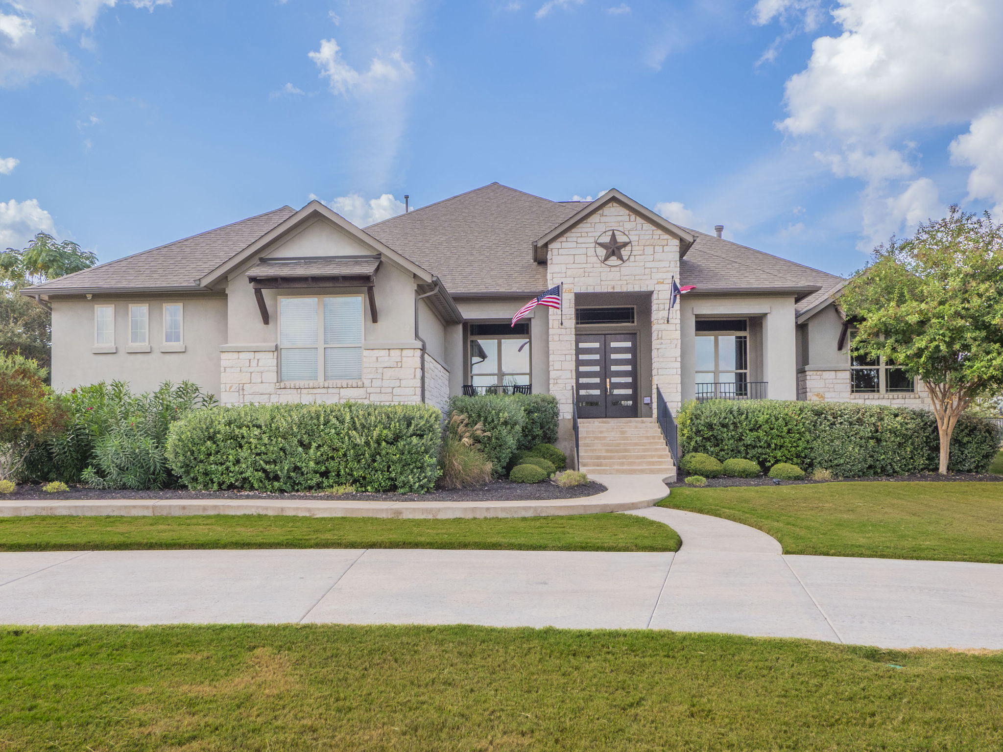 205 Standing Oak Drive Georgetown, TX 78633 - Photo 2 of 31 a front view of a house with a yard and potted plants