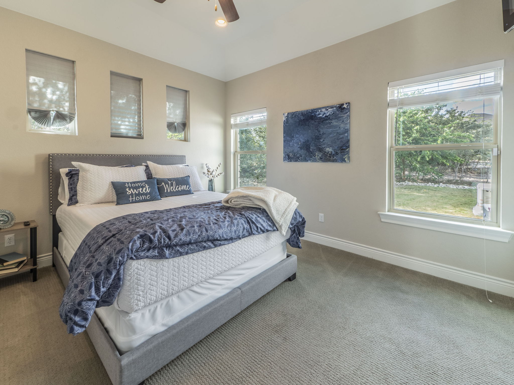 205 Standing Oak Drive Georgetown, TX 78633 - Photo 22 of 31 a bedroom with a bed and a window