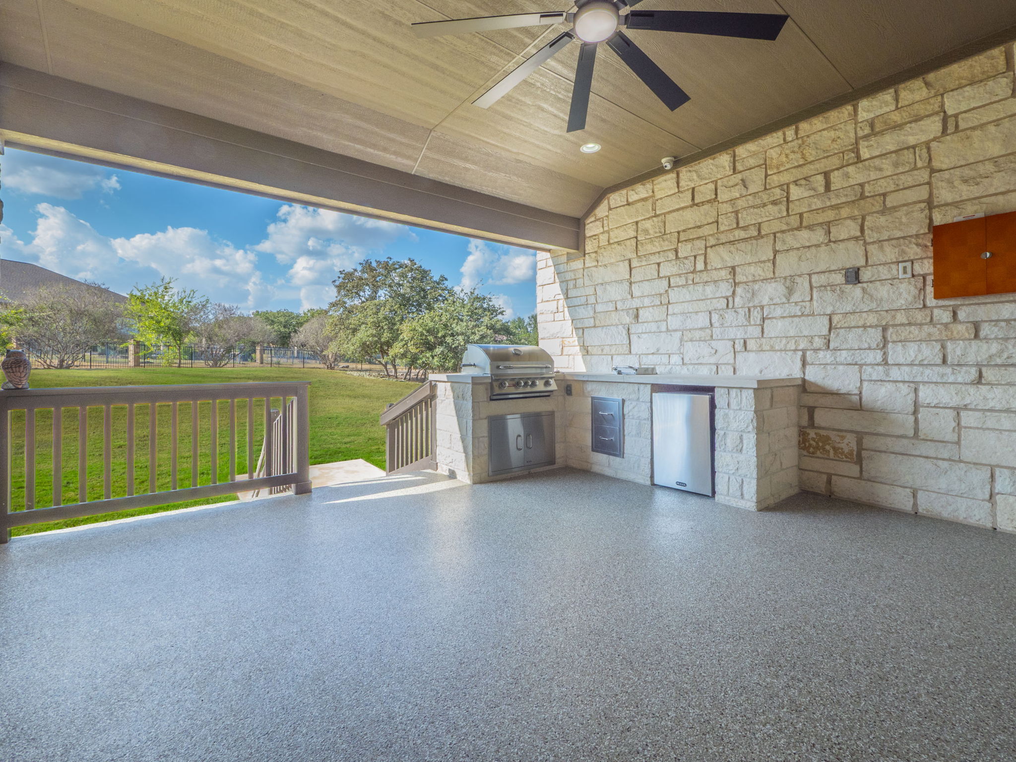 205 Standing Oak Drive Georgetown, TX 78633 - Photo 25 of 31 a view of an empty room with a fireplace and a window