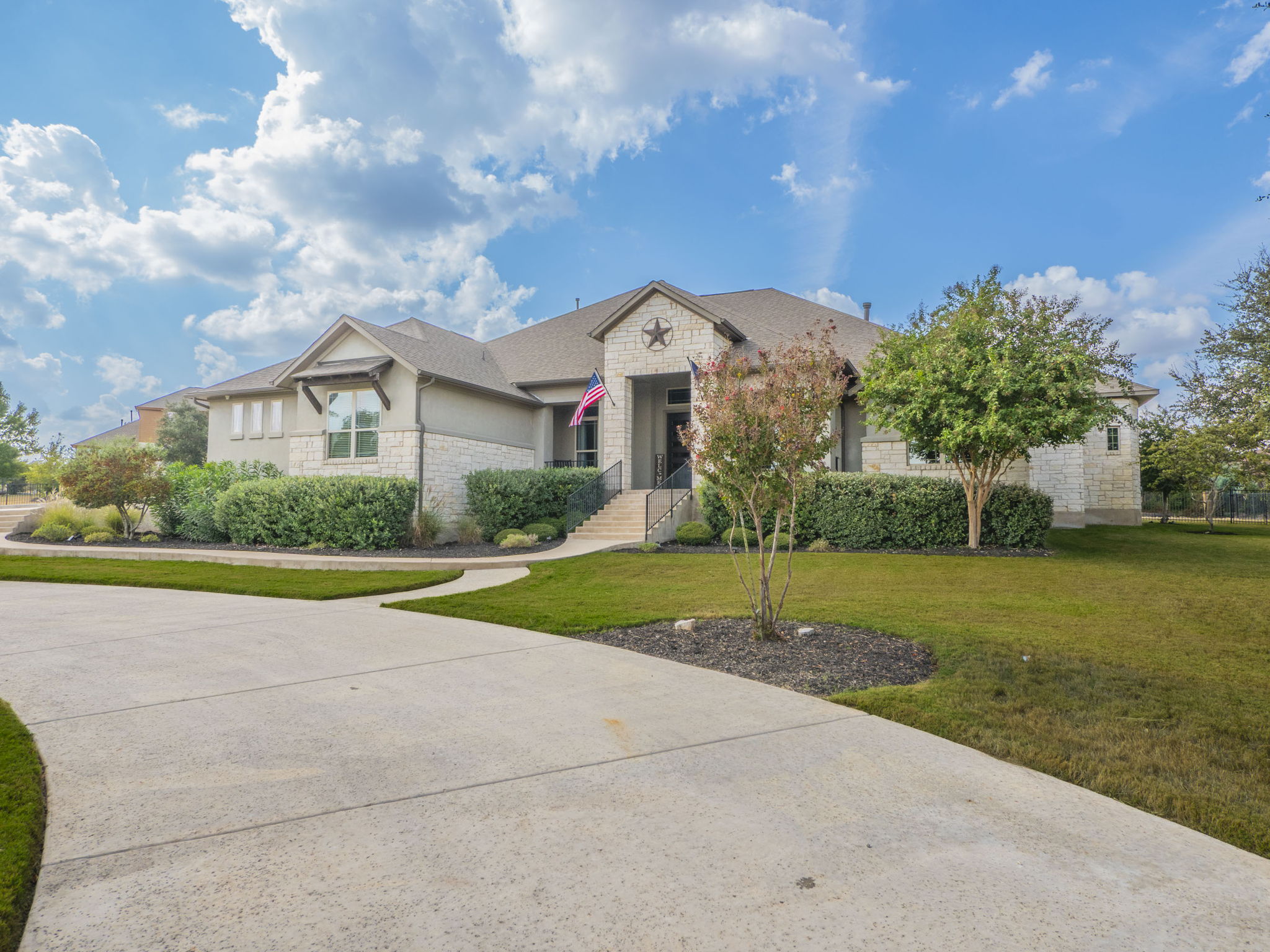 205 Standing Oak Drive Georgetown, TX 78633 - Photo 26 of 31 a view of a house with a big yard and large trees