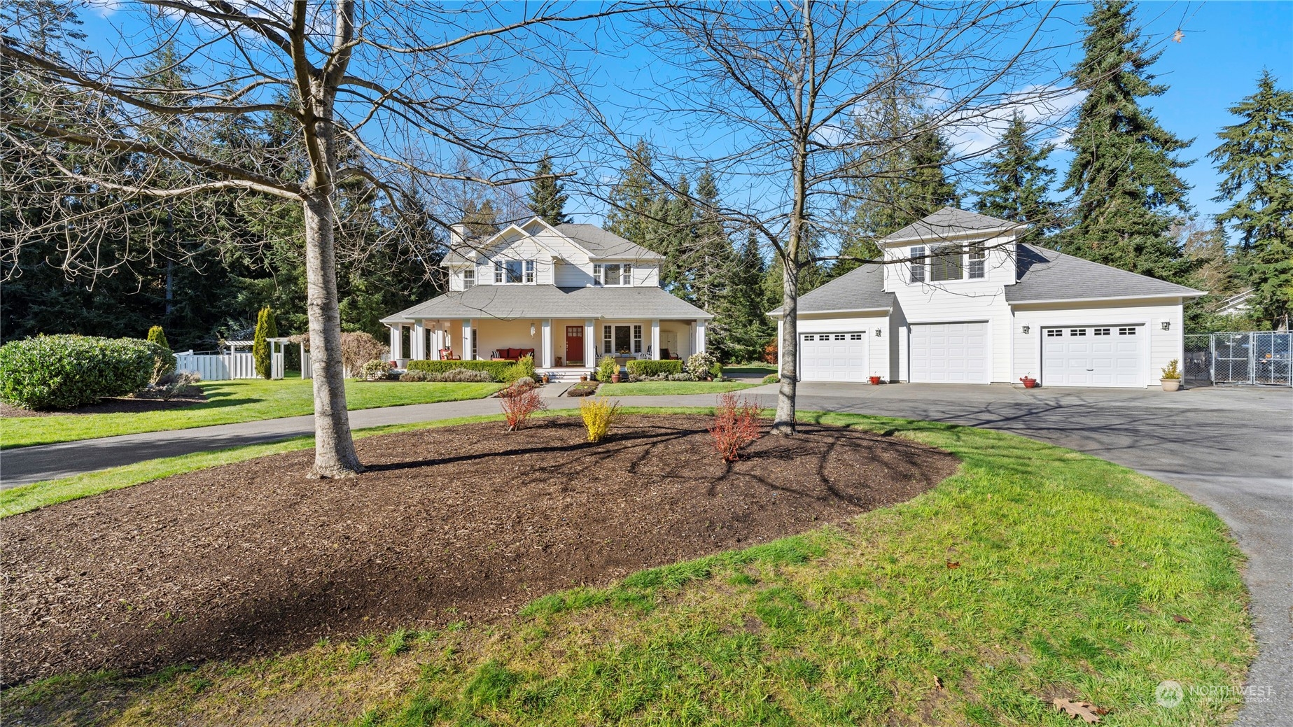 14293 Rosario Road Anacortes, WA 98221 - Photo 1 of 40 a house with trees in the background