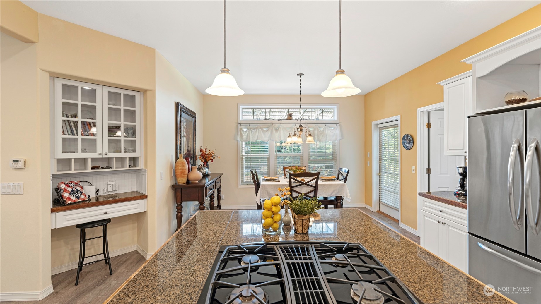 14293 Rosario Road Anacortes, WA 98221 - Photo 11 of 40 a room with furniture a rug a chandelier and a window