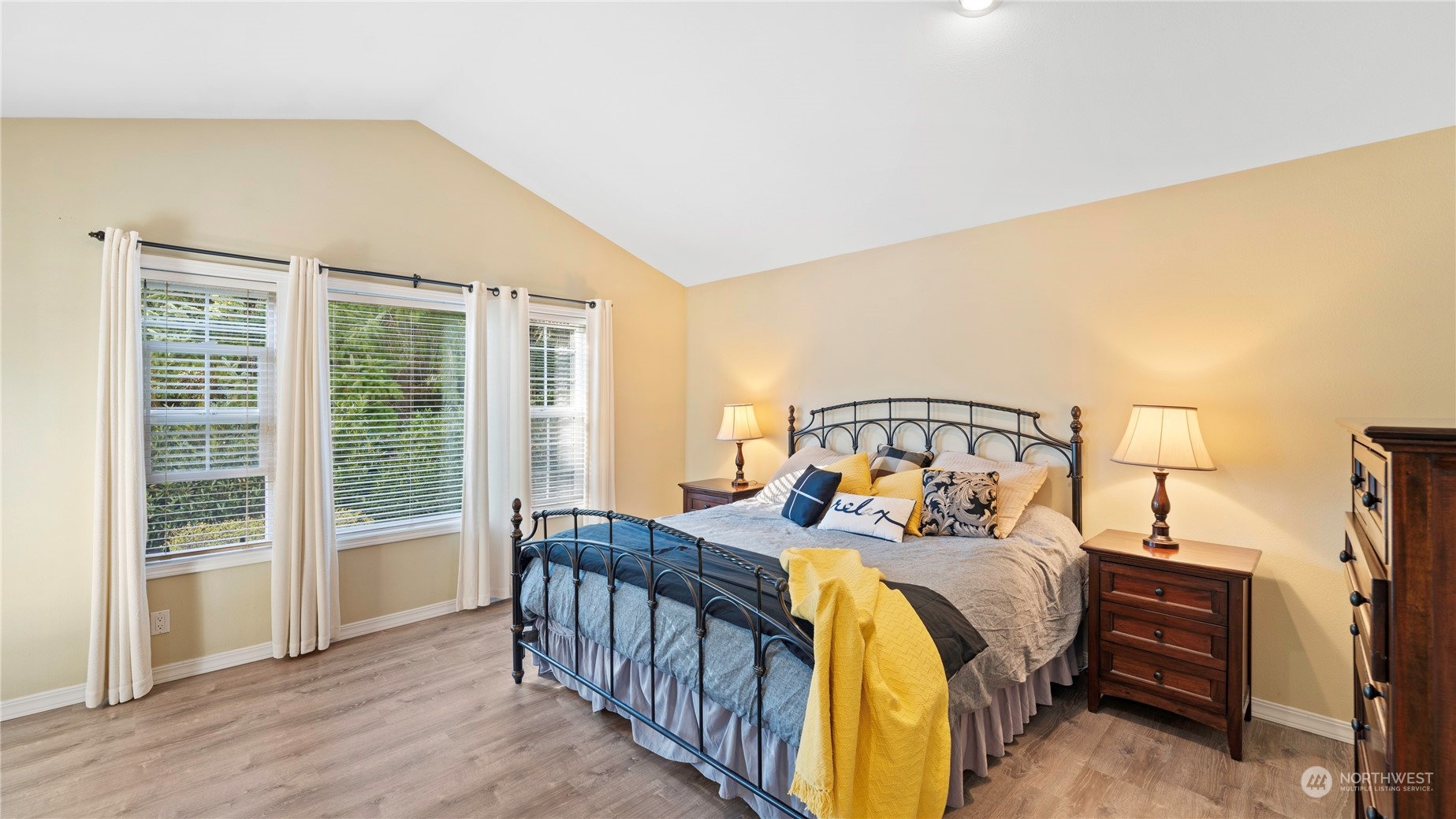 14293 Rosario Road Anacortes, WA 98221 - Photo 13 of 40 a bedroom with a bed and a large window
