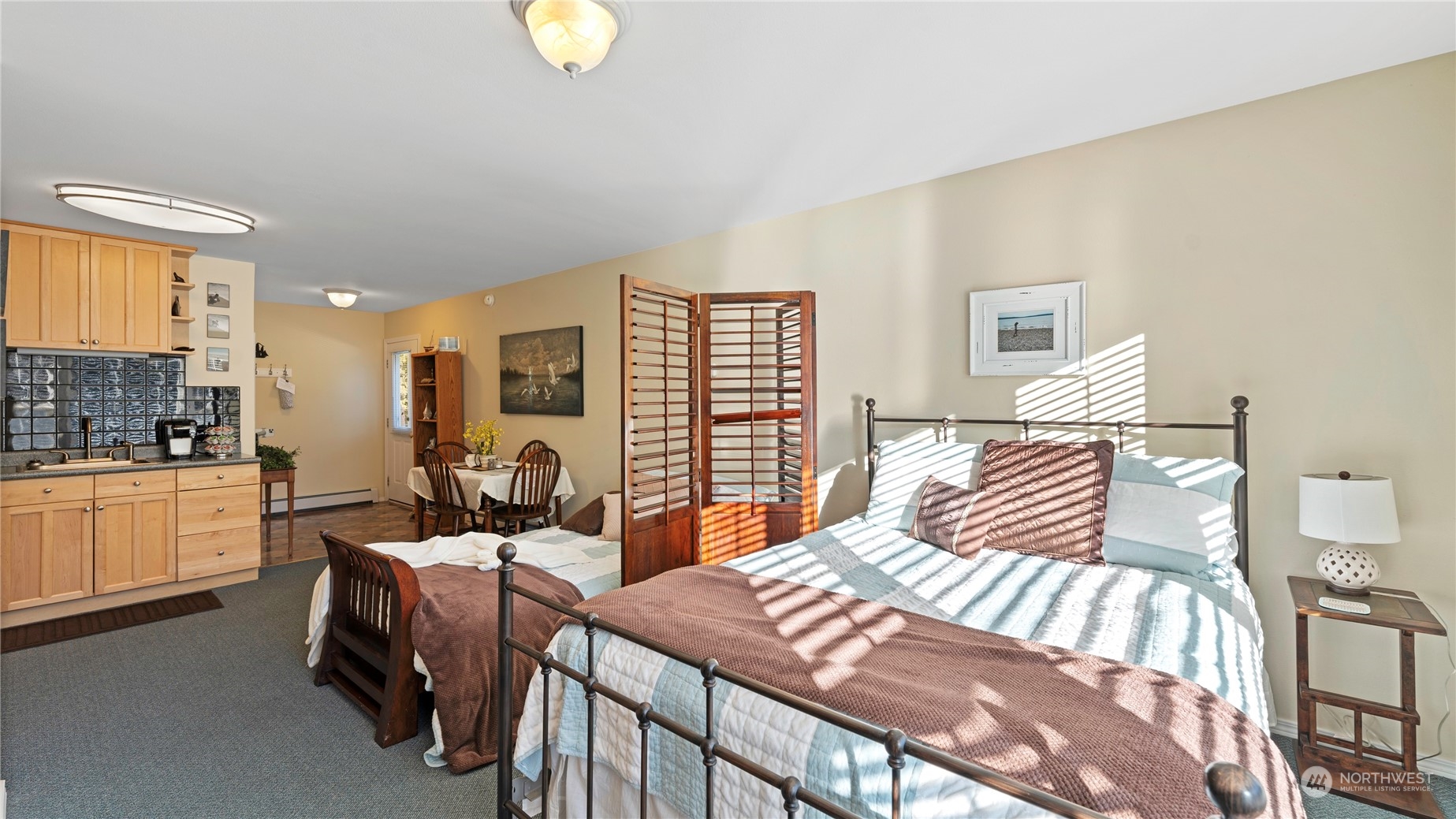 14293 Rosario Road Anacortes, WA 98221 - Photo 25 of 40 a bedroom with two beds and a large window