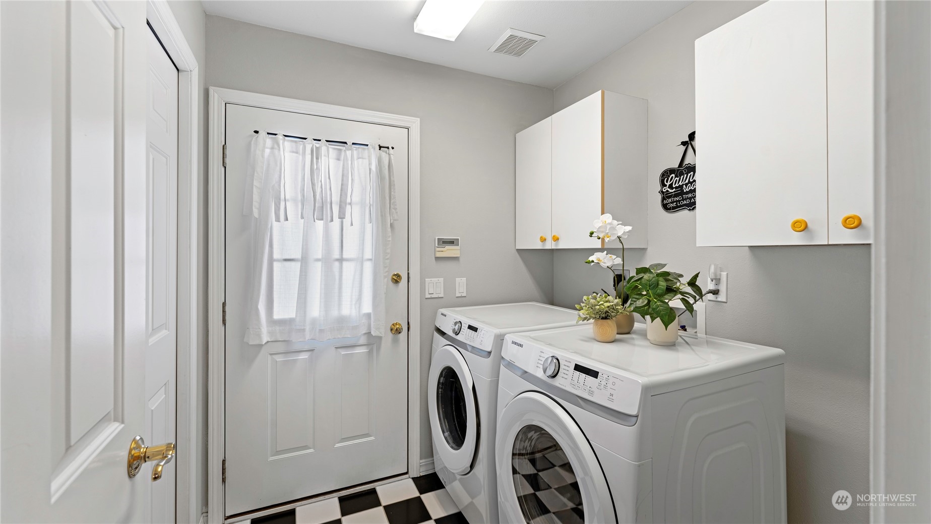 14293 Rosario Road Anacortes, WA 98221 - Photo 29 of 40 a utility room with dryer and washer