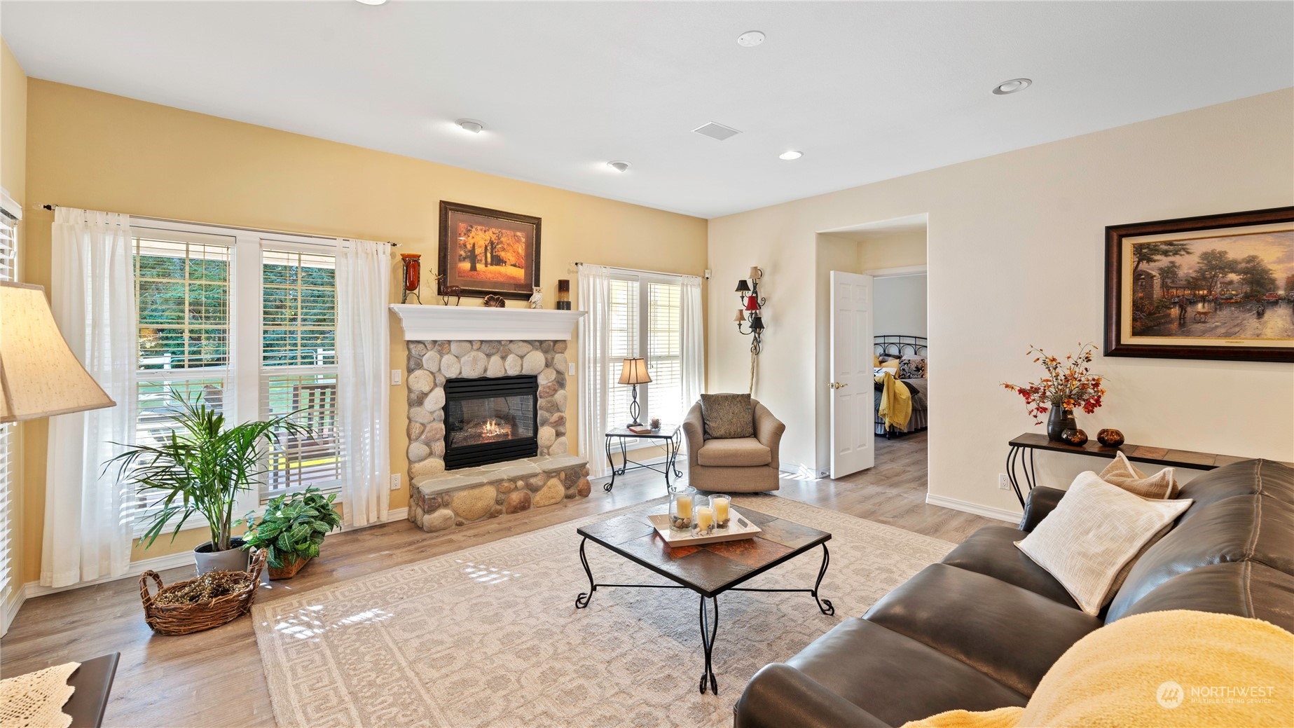 14293 Rosario Road Anacortes, WA 98221 - Photo 3 of 40 a living room with furniture and a fireplace