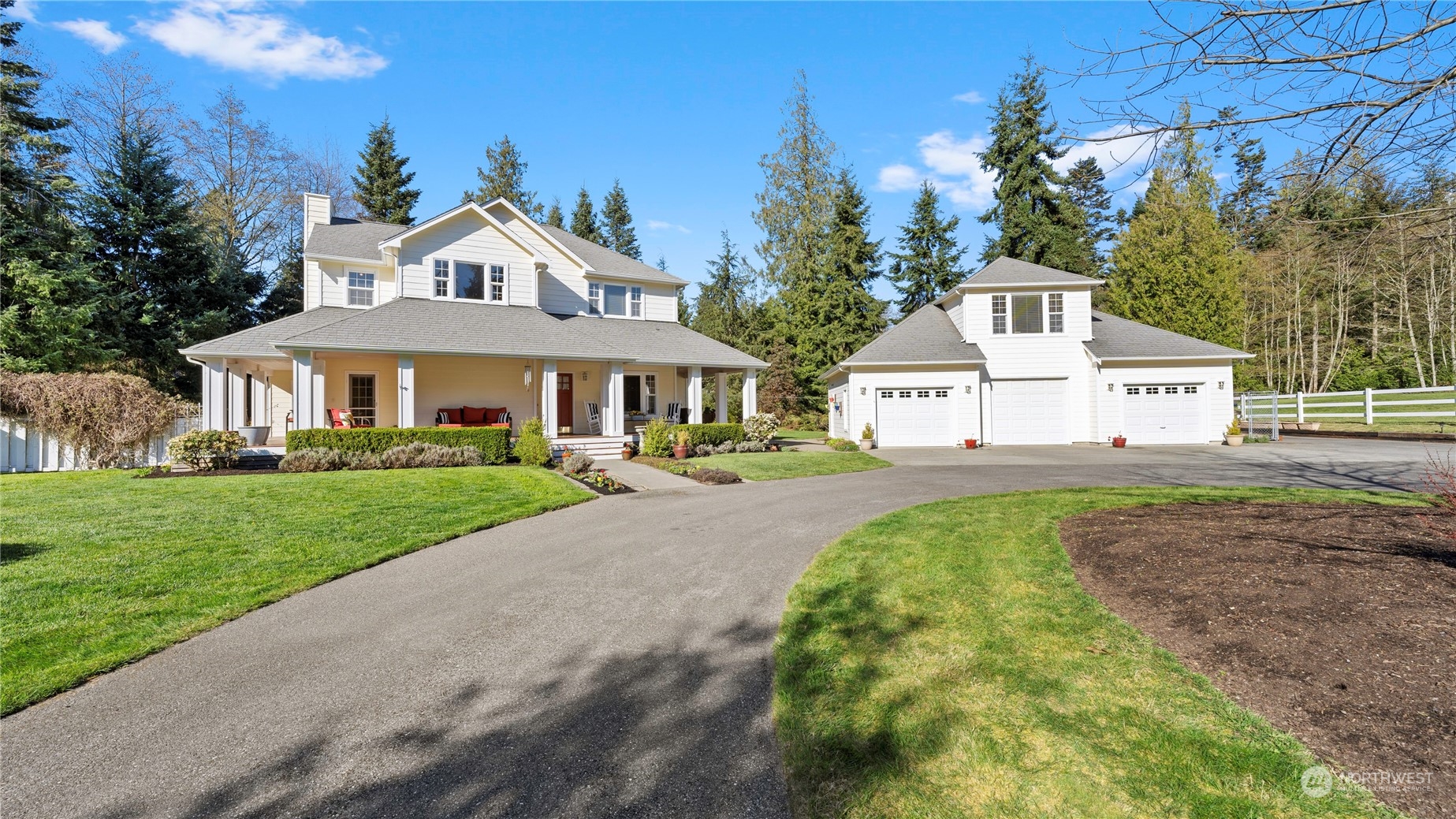 14293 Rosario Road Anacortes, WA 98221 - Photo 32 of 40 a front view of a house with a yard
