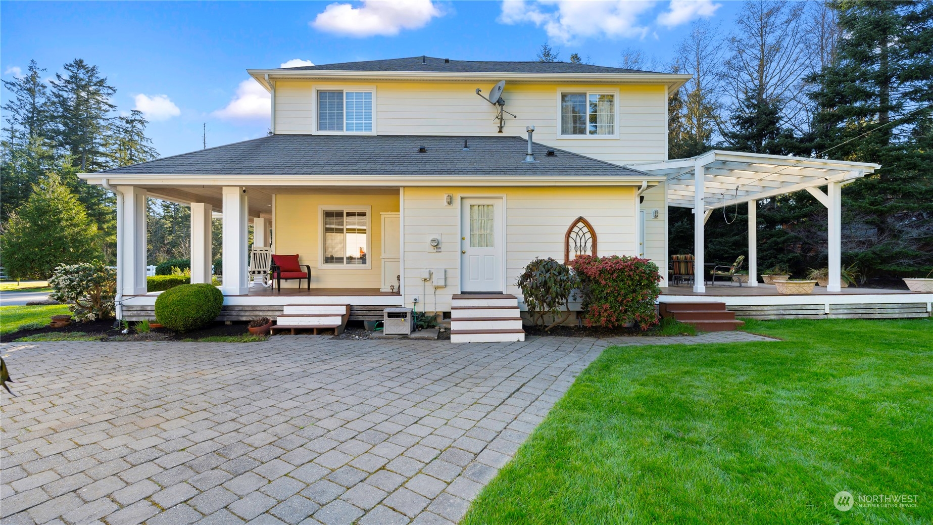 14293 Rosario Road Anacortes, WA 98221 - Photo 34 of 40 a house view with a garden space