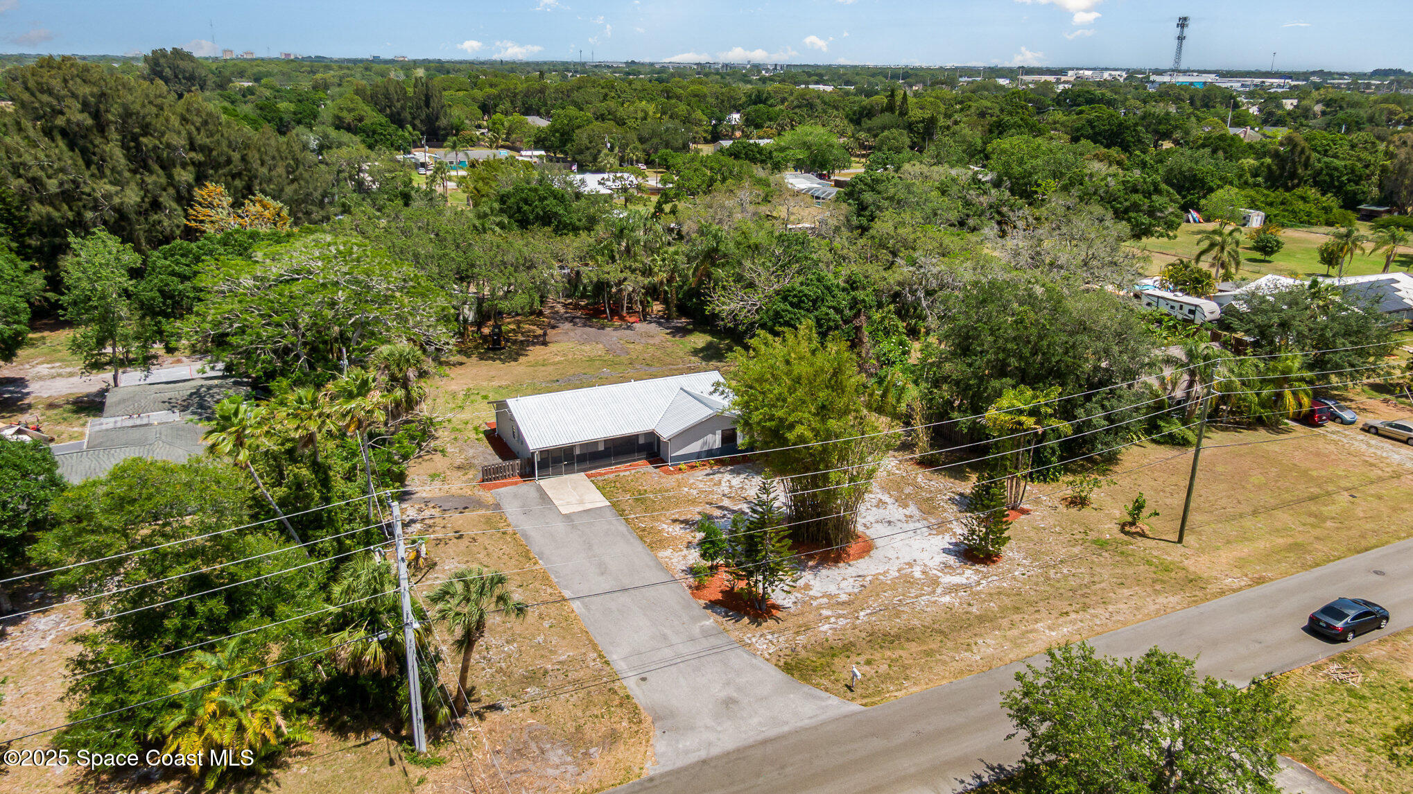 1981 Roc Rosa Drive Northeast Palm Bay, FL 32905 - Photo 25 of 29 an aerial view of a house with yard