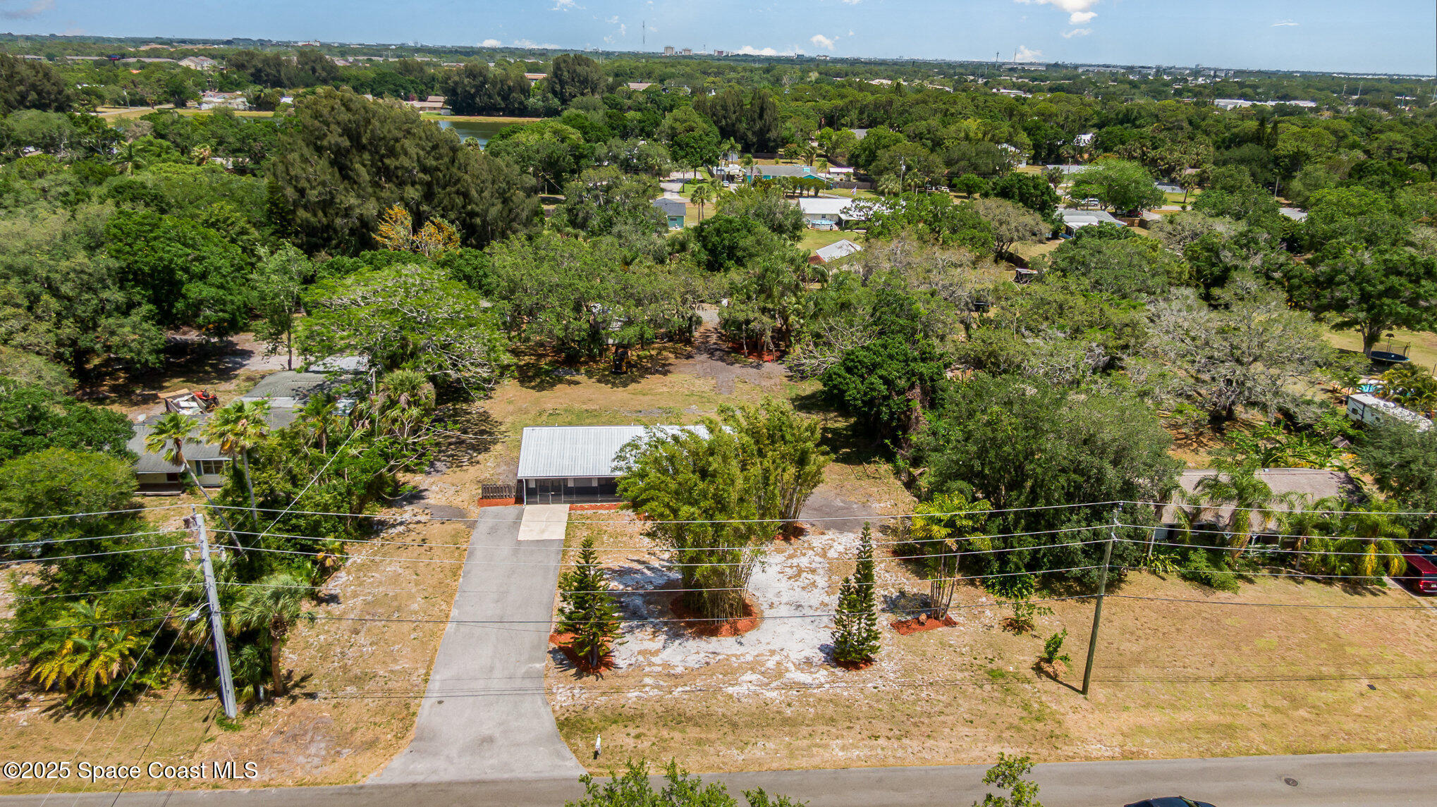 1981 Roc Rosa Drive Northeast Palm Bay, FL 32905 - Photo 26 of 29 a view of a yard with plants