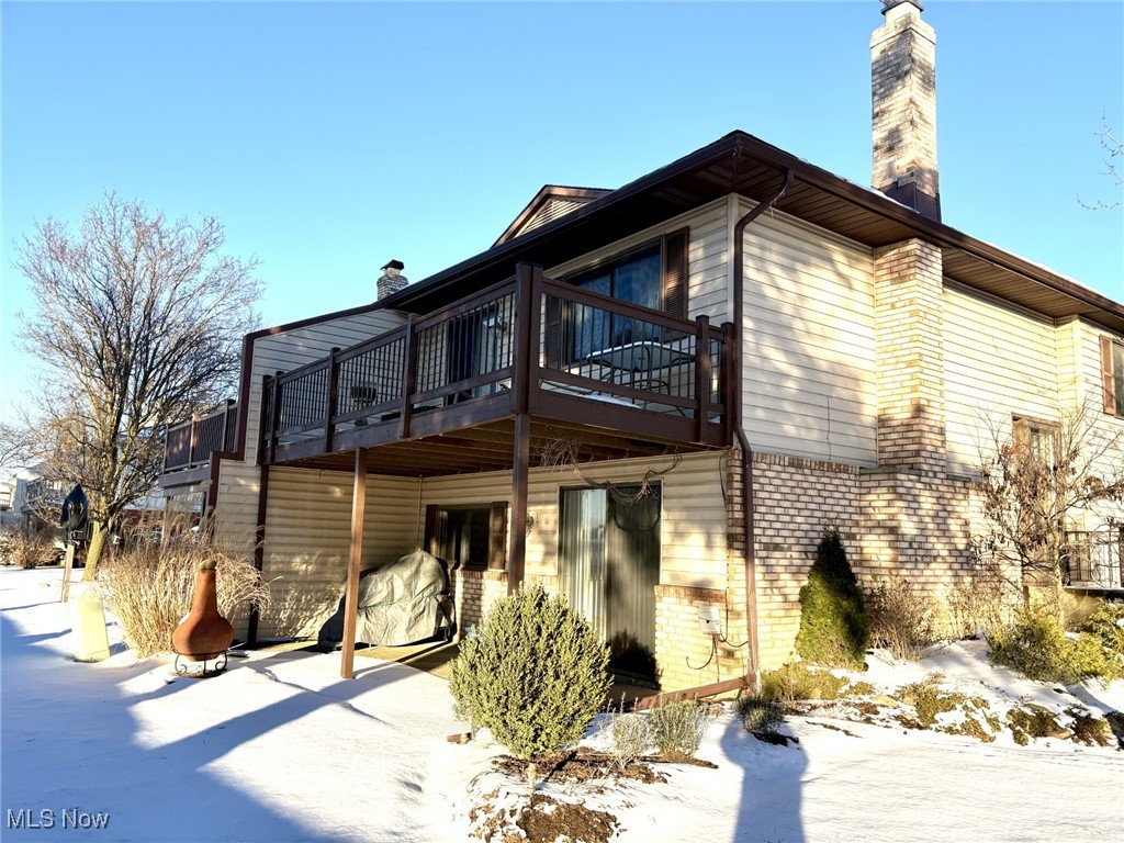 4015 Marks Road, Unit 3C Medina, OH 44256 - Photo 27 of 36 Snow covered house featuring a deck