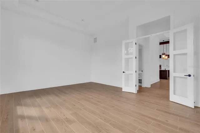 a bathroom with a sink mirror toilet and shower