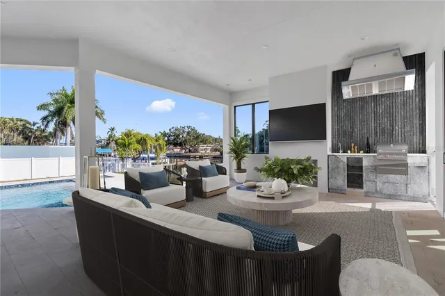 a view of a swimming pool with an outdoor seating