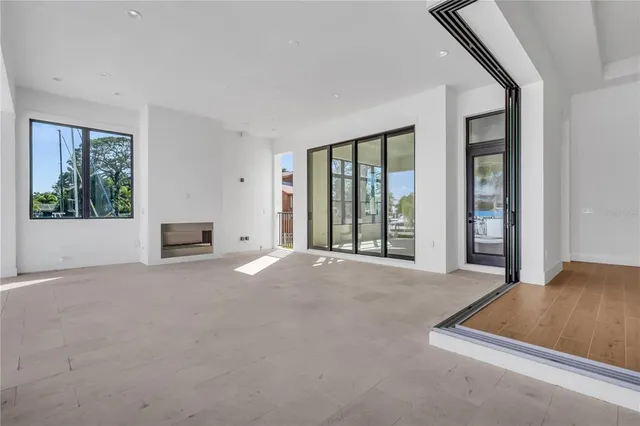 a view of livingroom with furniture and natural light
