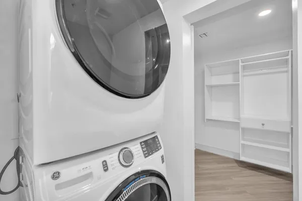a view of livingroom with washer and dryer