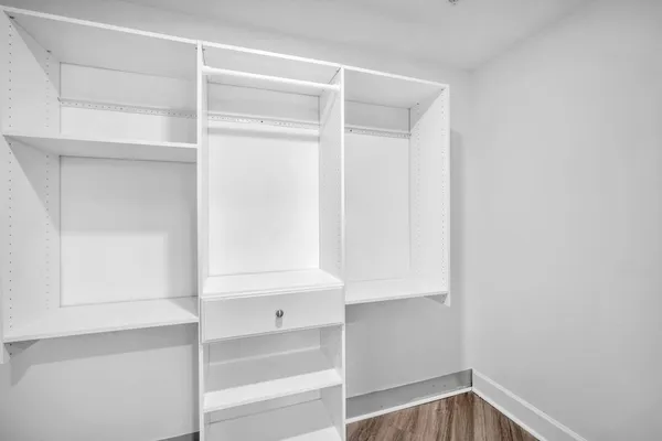 a view of an empty walk in closet