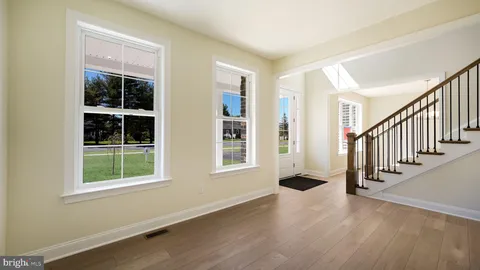 a view of a hallway with staircase