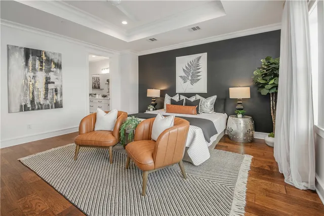 a bathroom with a granite countertop sink two mirror and window