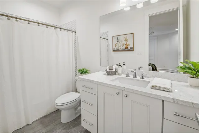 a bathroom with a bathtub and shower curtain