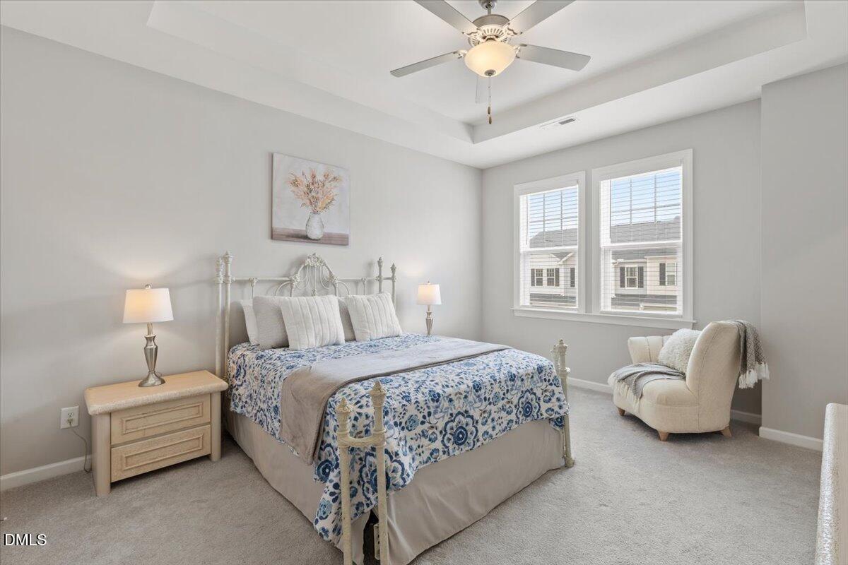 435 Leighann Ridge Lane Rolesville, NC 27571 - Photo 13 of 21 a bedroom with bed and window