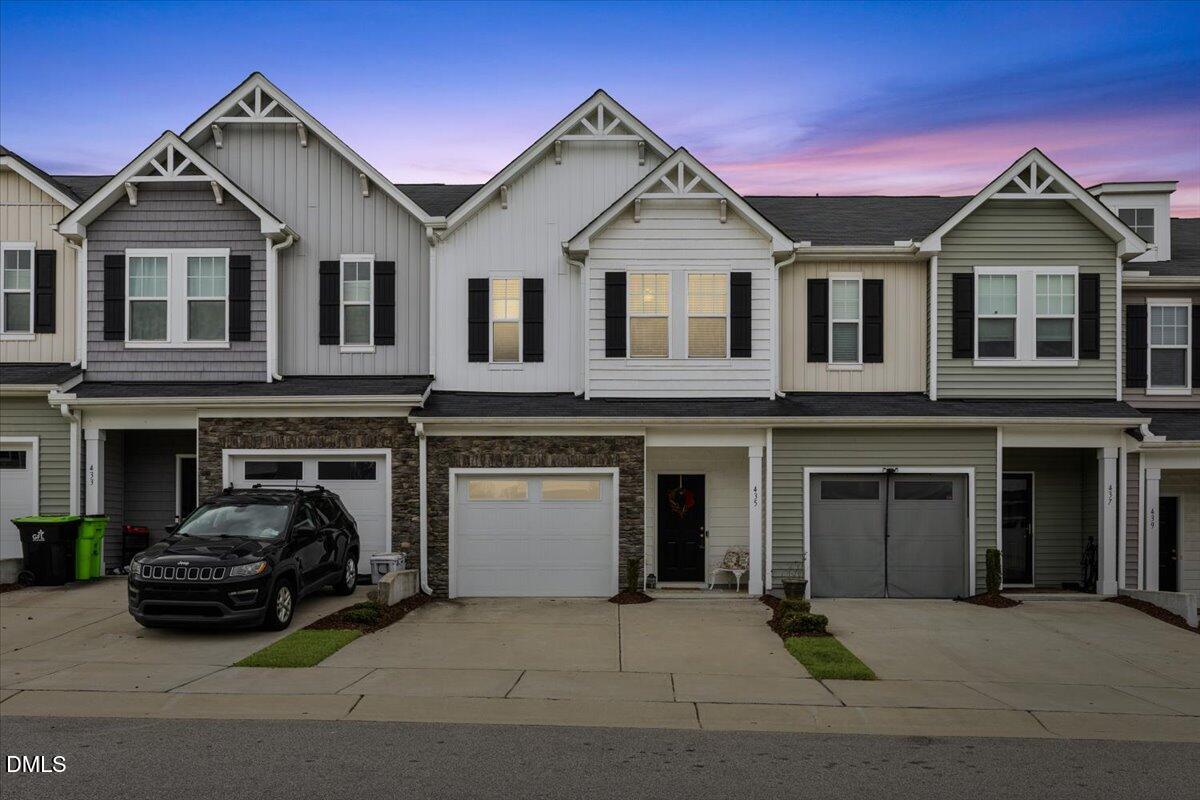 435 Leighann Ridge Lane Rolesville, NC 27571 - Photo 2 of 21 a view of a car park in front of house