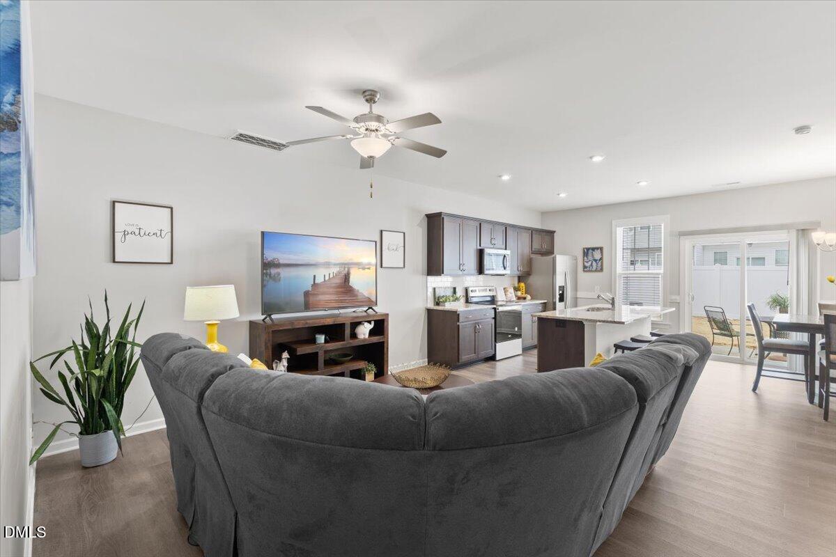 435 Leighann Ridge Lane Rolesville, NC 27571 - Photo 5 of 21 a living room with furniture kitchen view and a window