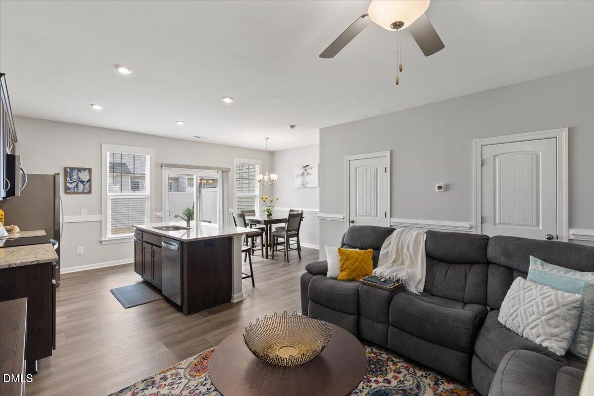 435 Leighann Ridge Lane Rolesville, NC 27571 - Photo 6 of 21 a living room with furniture and a wooden floor