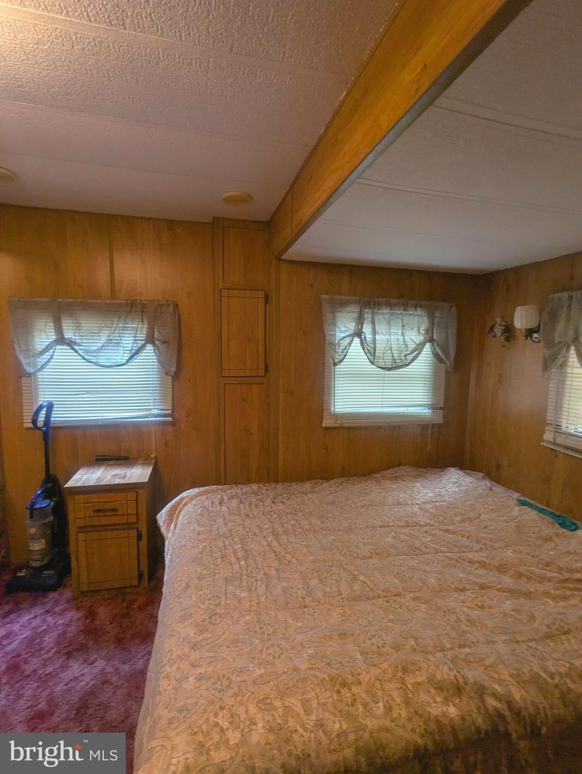4 Hilo Road Falling Waters, WV 25419 - Photo 11 of 13 a bedroom with a bed and a potted plant