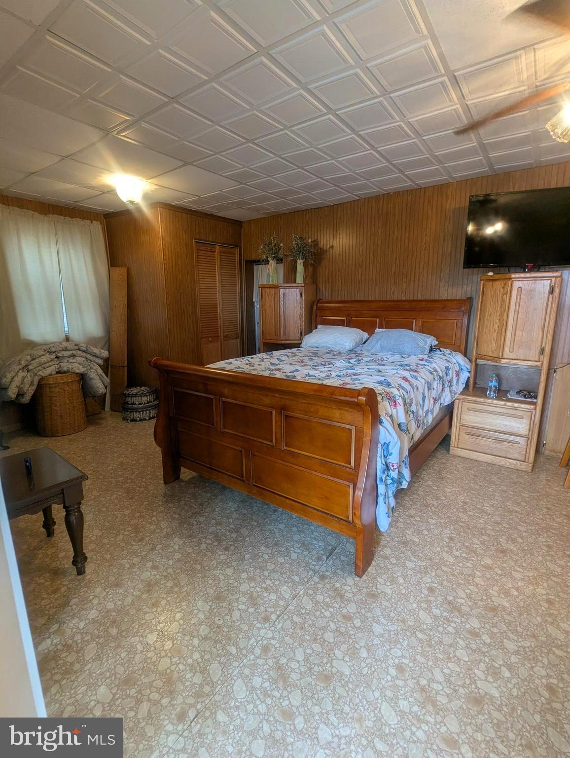 4 Hilo Road Falling Waters, WV 25419 - Photo 4 of 13 a bedroom with a bed and furniture