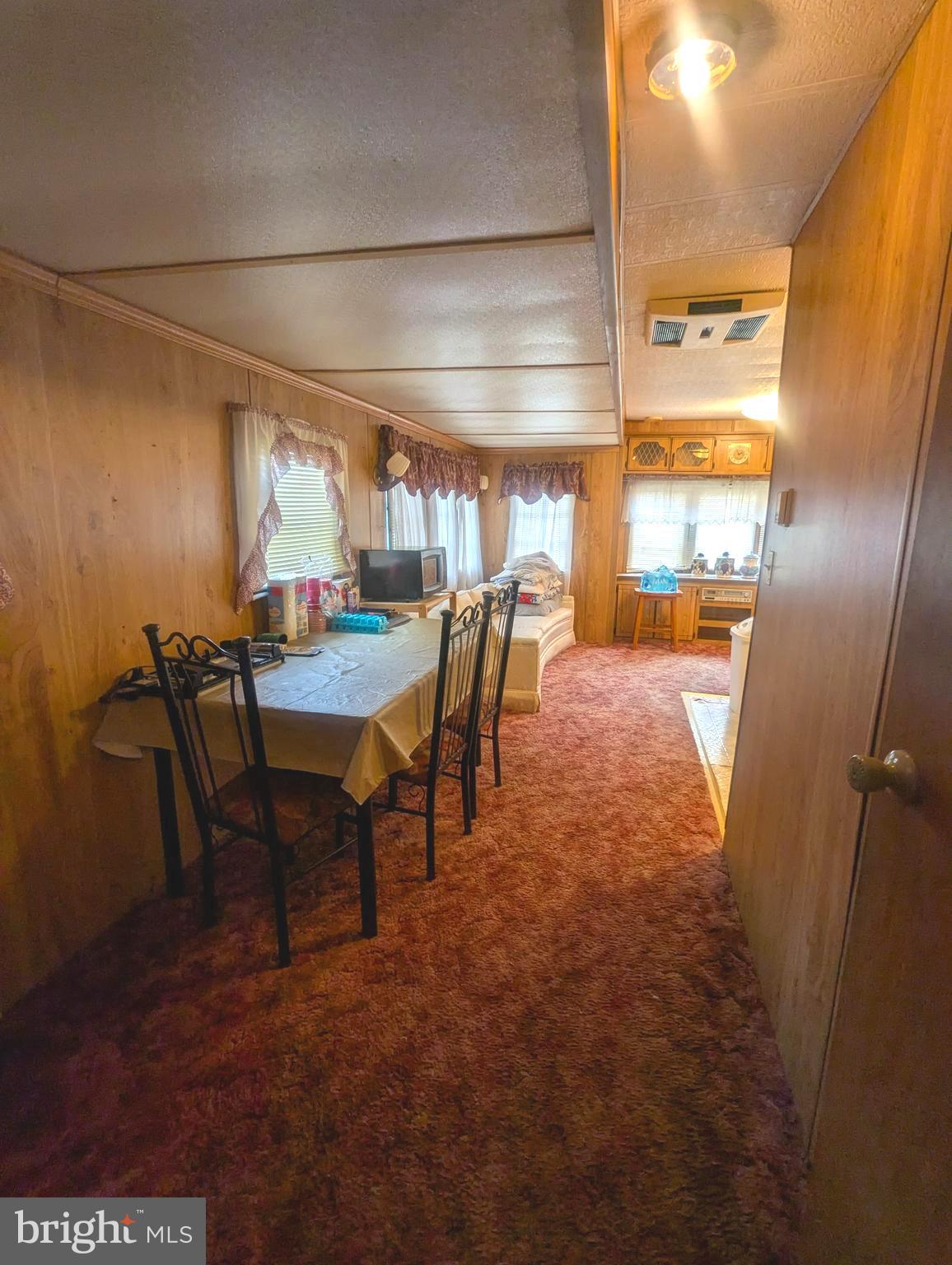 4 Hilo Road Falling Waters, WV 25419 - Photo 10 of 13 a view of a dining room with furniture