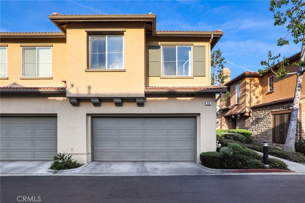 30 Moonstone Irvine, CA 92602 - Photo 7 of 7 a front view of a house with garage